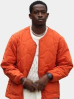 F1 The Movie 2025 Joshua Pearce Orange Quilted Jacket
